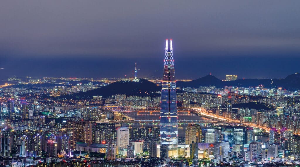 A panoramic view of Seoul with the Namsan Seoul Tower in the background.