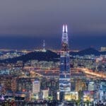 A panoramic view of Seoul with the Namsan Seoul Tower in the background.